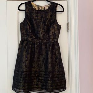 Black dress with subtle gold shimmer